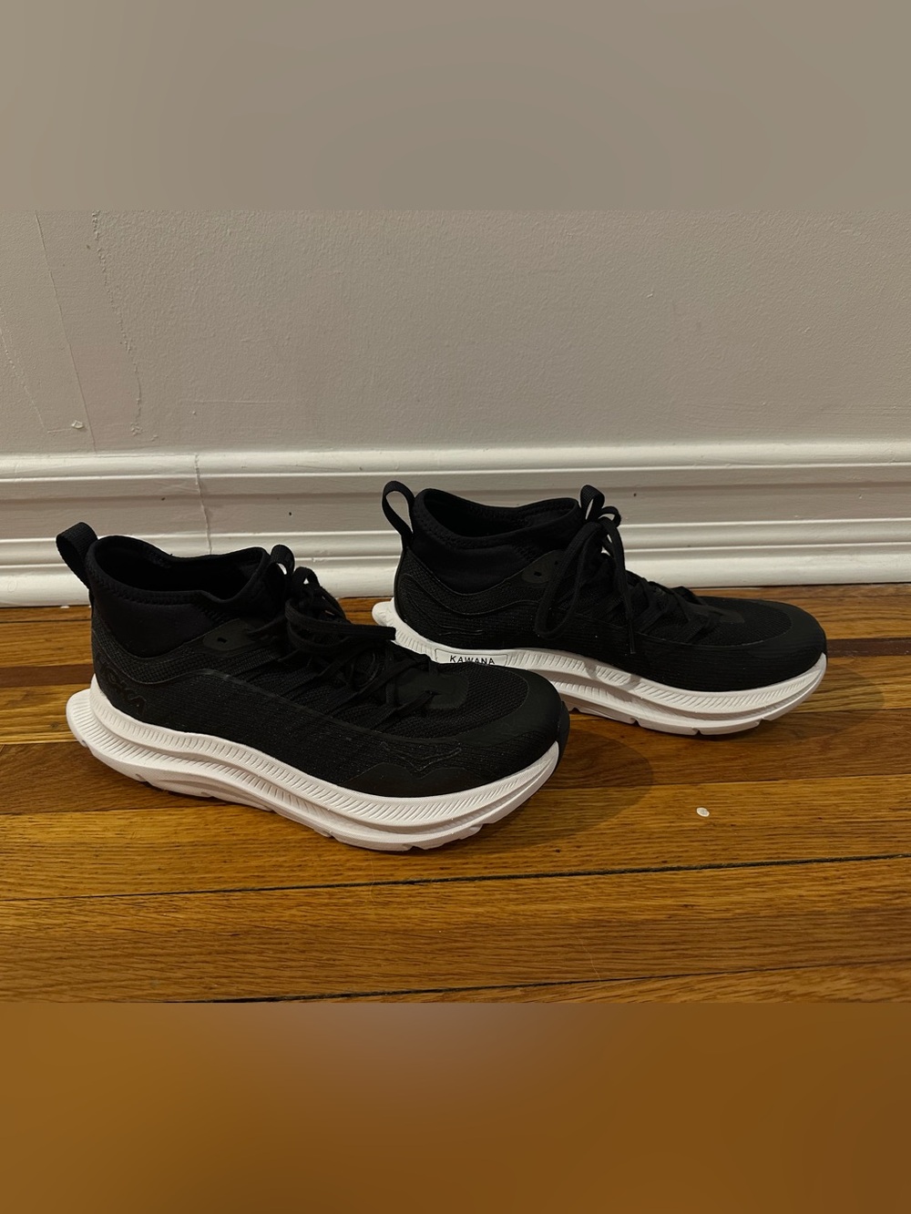 Hoka Kawana Mid running and walking shoe, black with white sole. Size 9